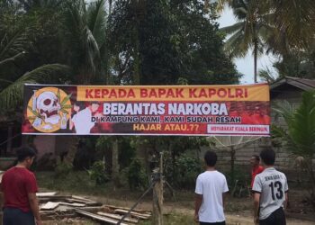 Pasang Spanduk, Warga Minta Kapolri Berantas Narkoba di Desa Kuala Beringin