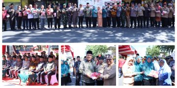 Bupati Asahan Pimpin Gerakan Pembagian Bendera Merah Putih