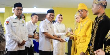 Hadiri Nikah Massal 23 Pasangan, Zakiyuddin Serahkan Buku Nikah dan Beri Uang Saku Bagi Pengantin